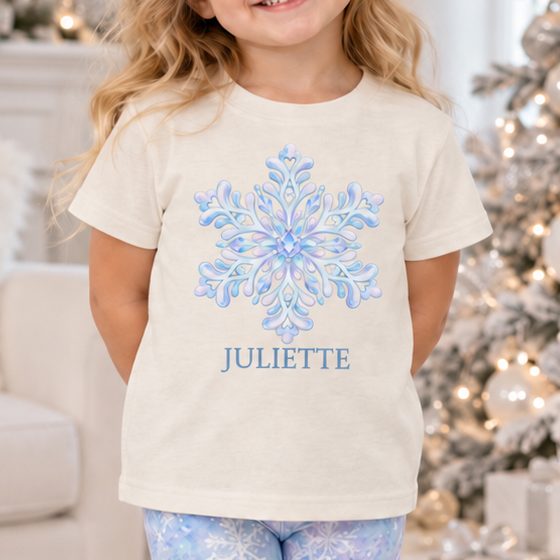 Personalized toddler Christmas shirt with pastel blue snowflake and custom name